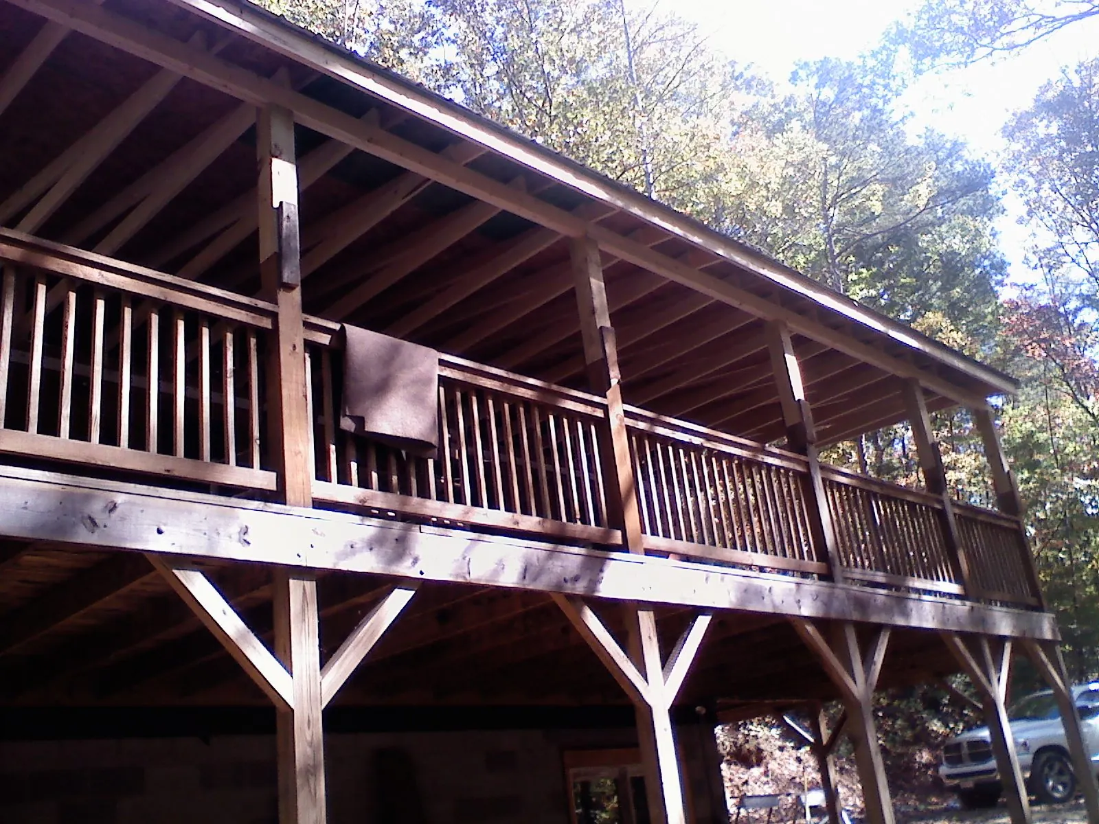 Timber framing under a new elevated porch and deck — Roof Leak Repair in Lacygne by Roofing Brothers